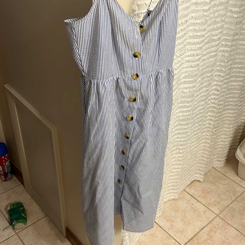 Striped blue and white knee length dress